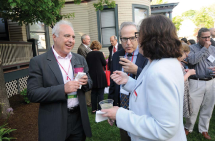 Jeffrey Lurie '73 greets fellow alumni at the Jonas Clark Fellows event during Reunion Weekend.
