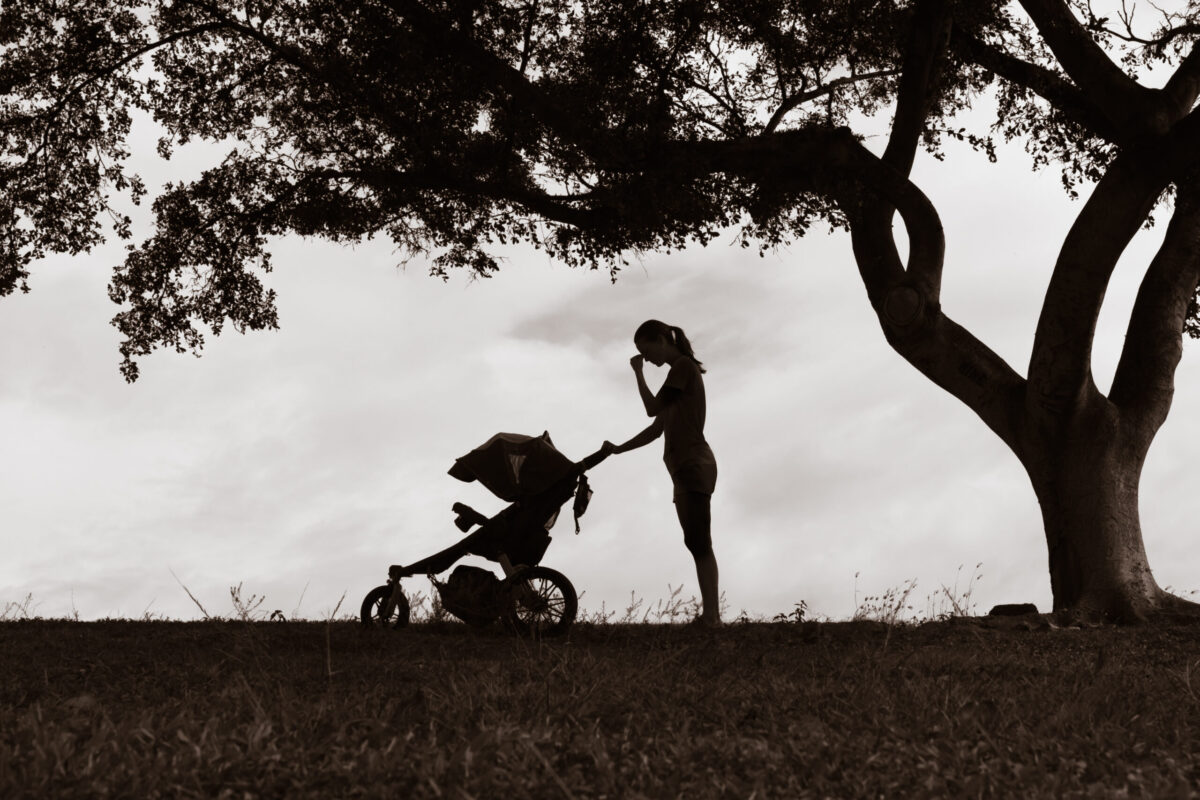 Mother pushing stroller