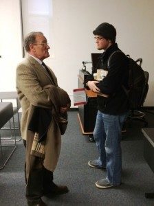Sophomore Steven Isaacson continues the conversation with guest lecturer Jeffrey Alexander before leaving Prof. Robert Boatright's political science class (Dec. 2).