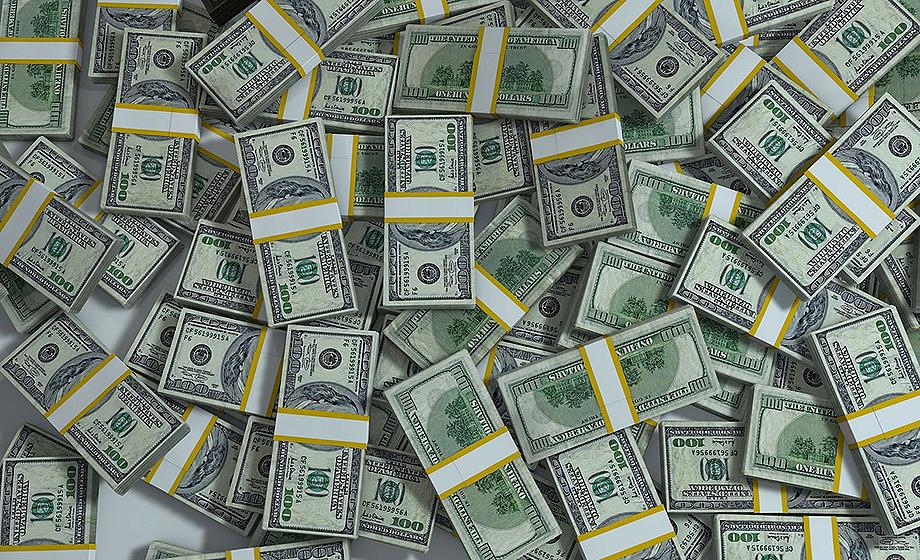 Pile of hundred dollar bills