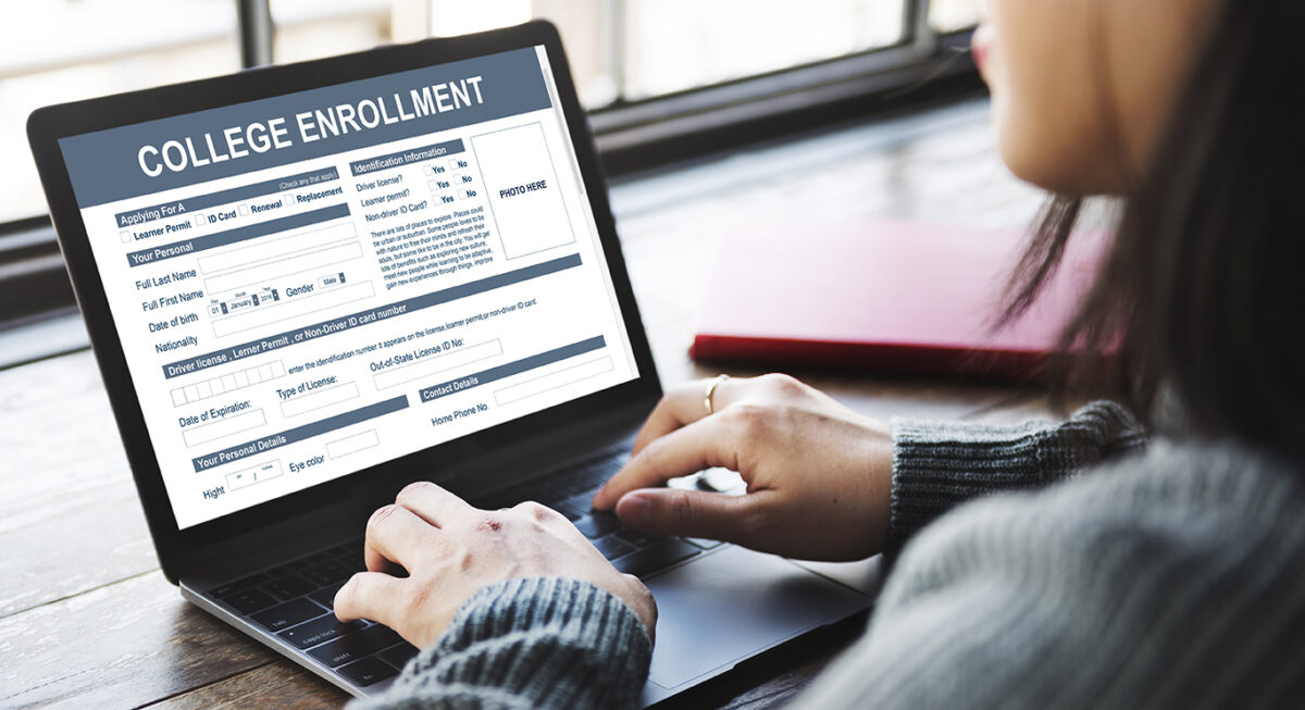 Student at computer with college applicatio