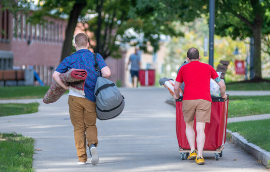 students moving in to residence hall