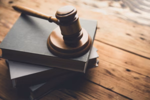 Gavel on top of small stack of books