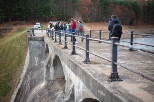 students visit a dam in Worcester