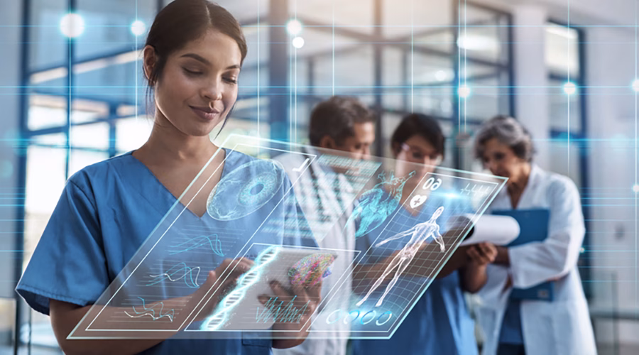 Technology in Healthcare - healthcare professionals looking over laptops and images