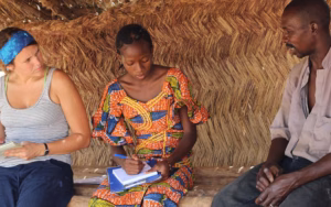 International Development and social change student with community leaders in africa