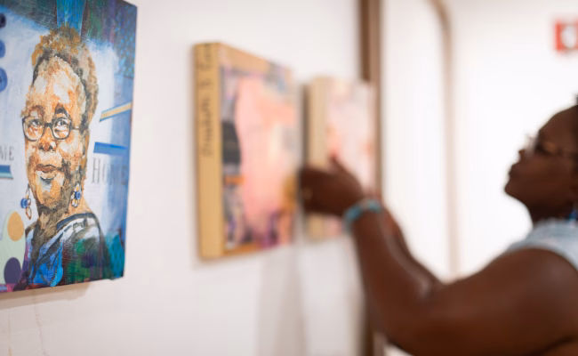 Student looking at art gallery