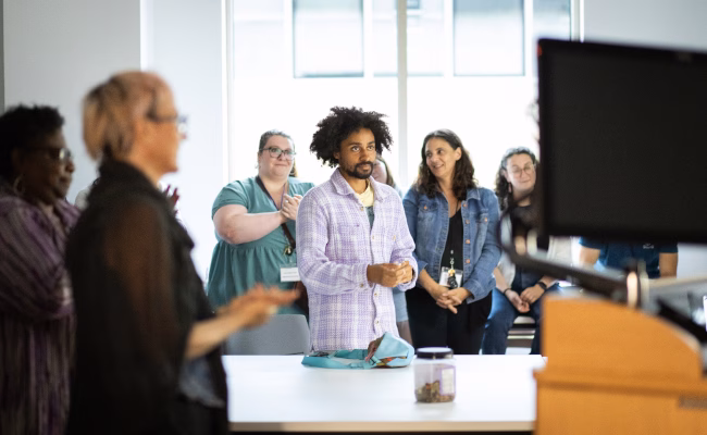 Student giving art presentation