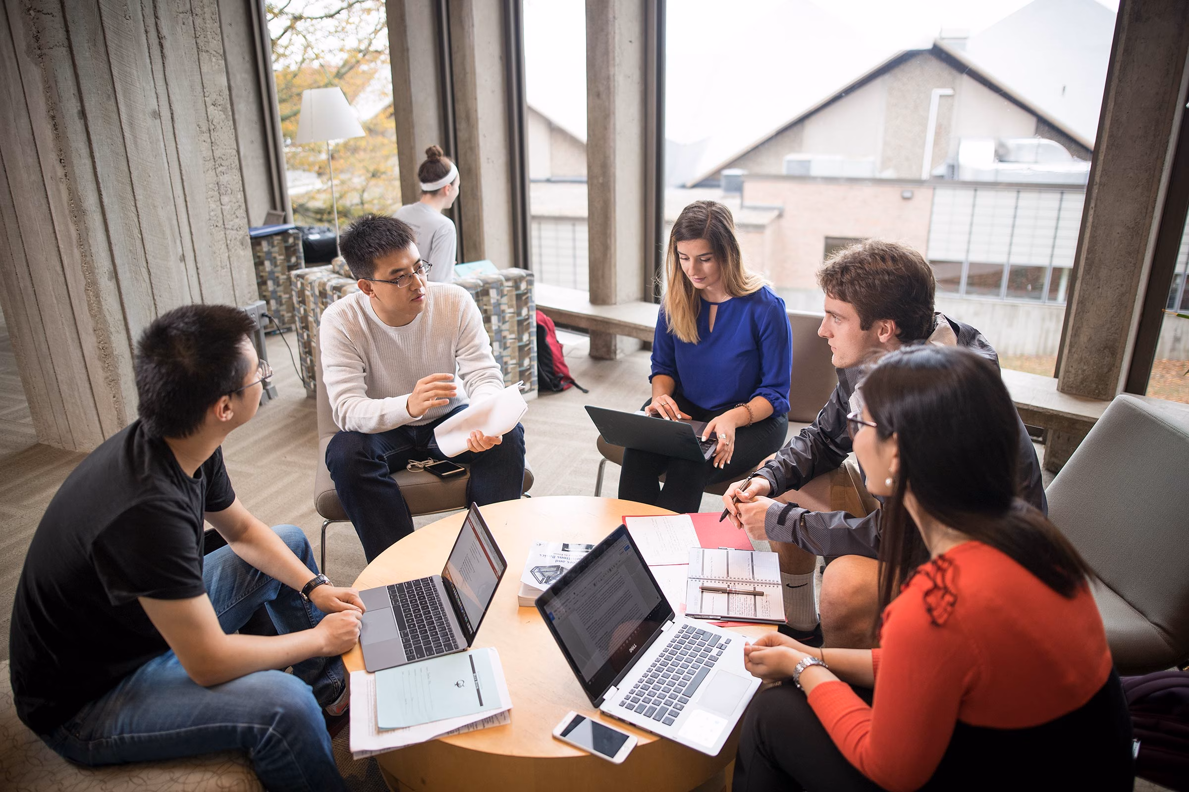 A group of graduate students gather for a study session