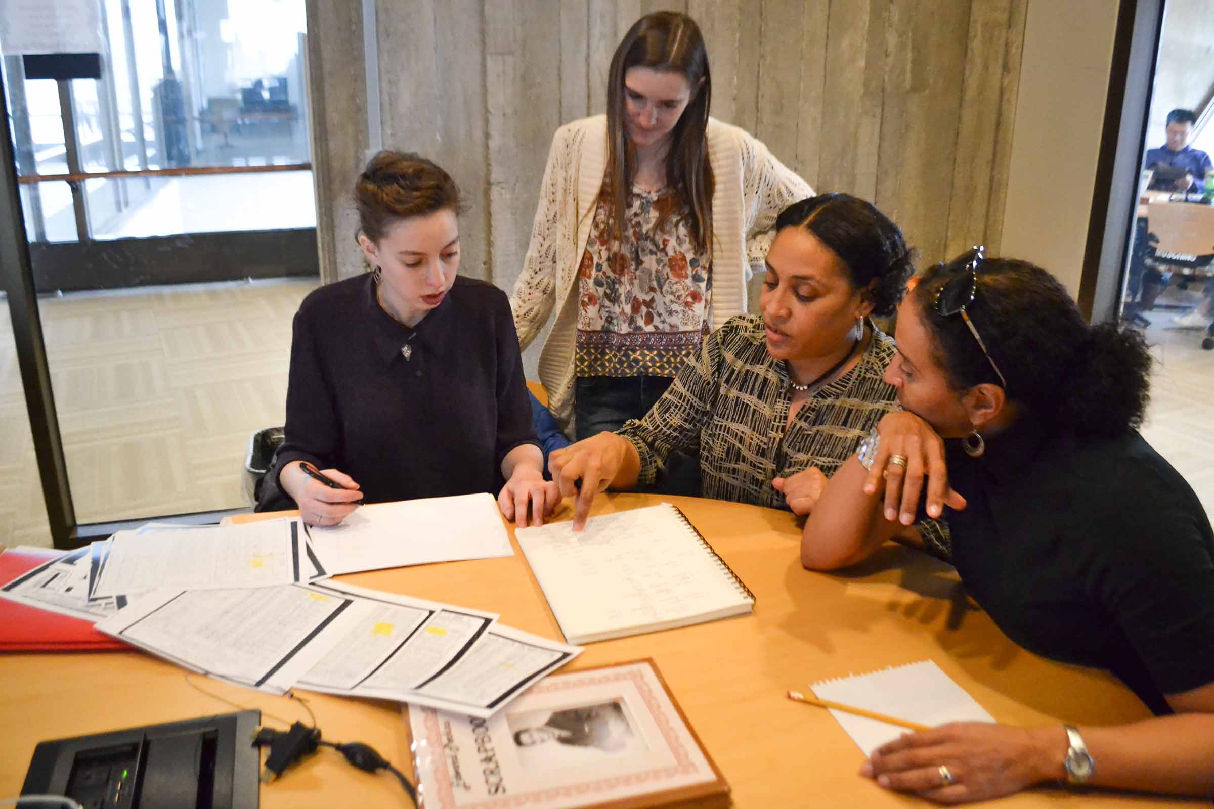Students in a public history class conduct the type of research they would undertake at the graduate level