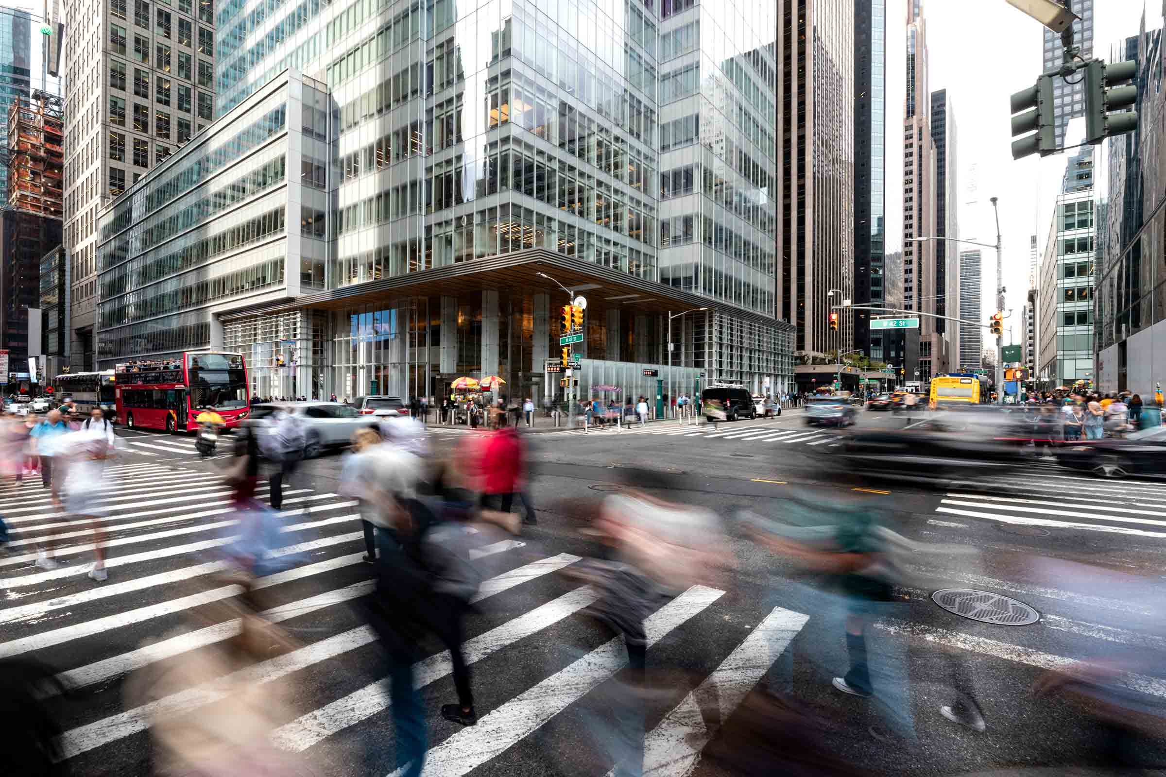 Crowd of people crossing the street