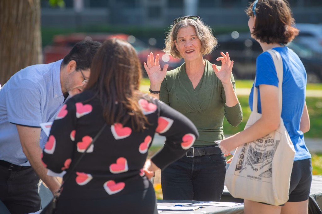 Environmental humanities program directors gather with students at the launch event of the School of Climate, Environment, and Society