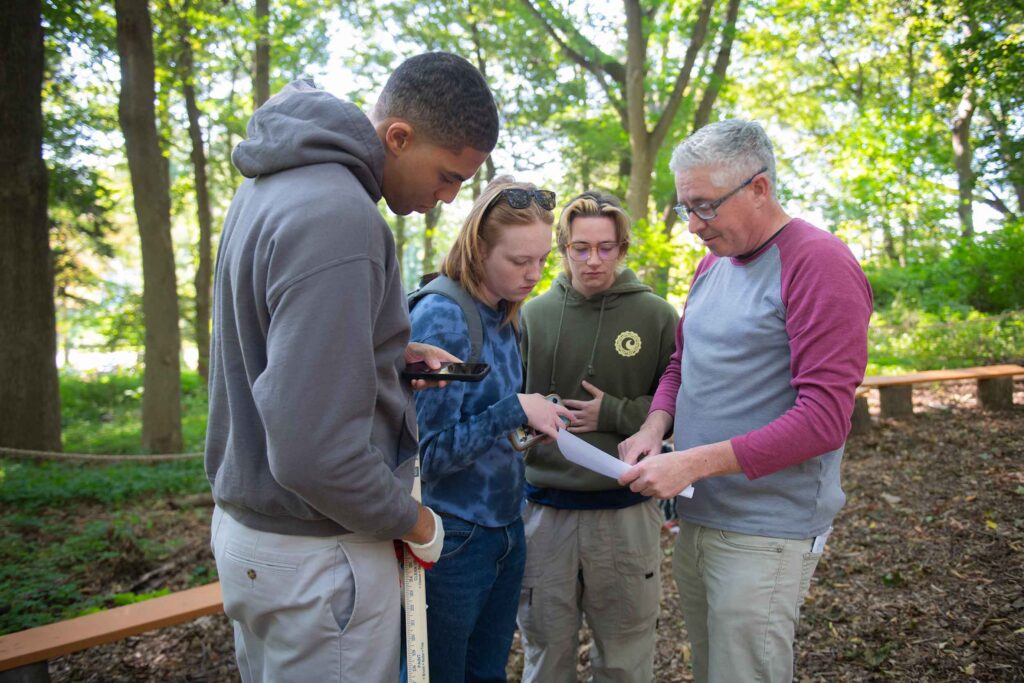 Students in the Hadwen Arboretum during the launch of the School of Climate, Environment, and Society