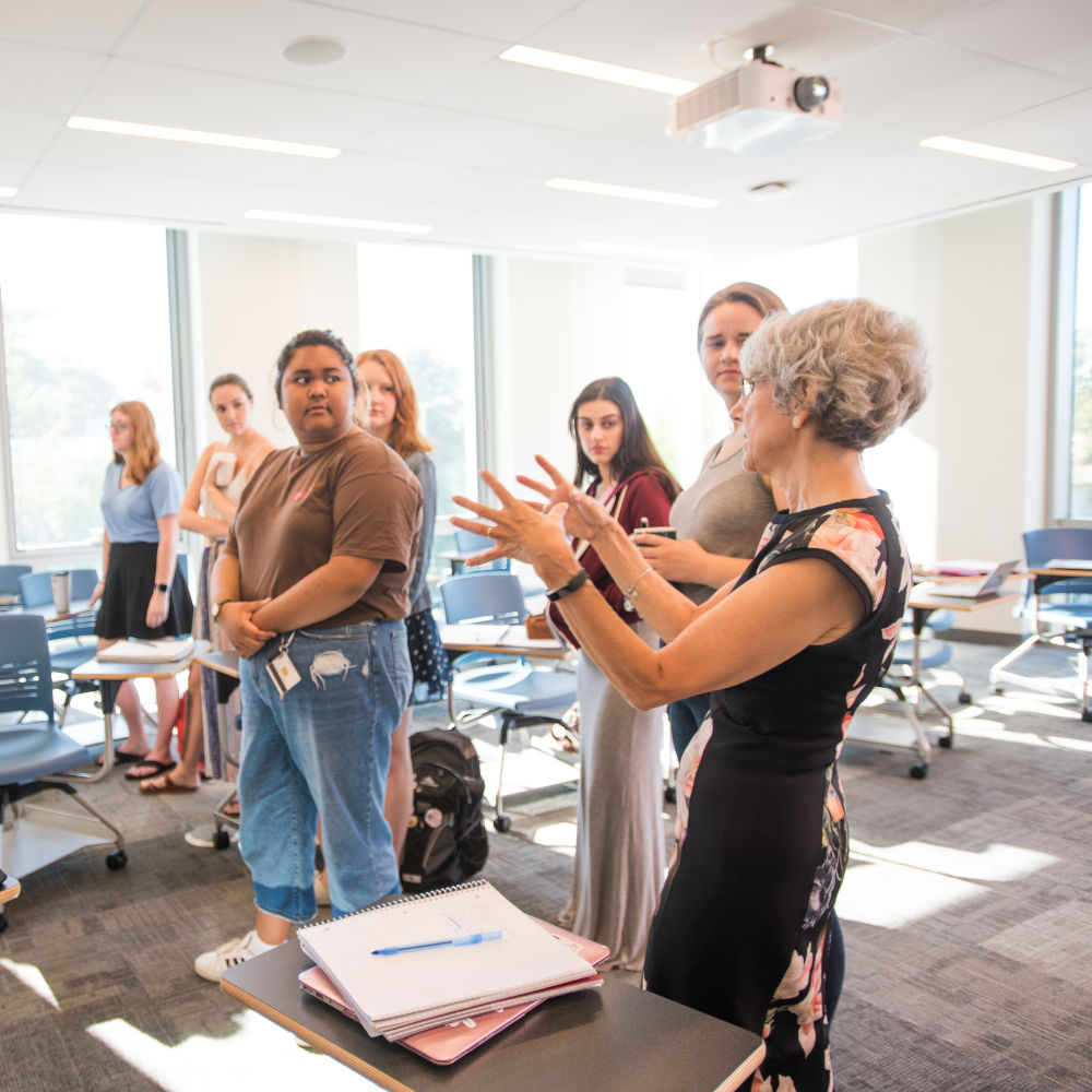 Nancy Budwig with a group of students