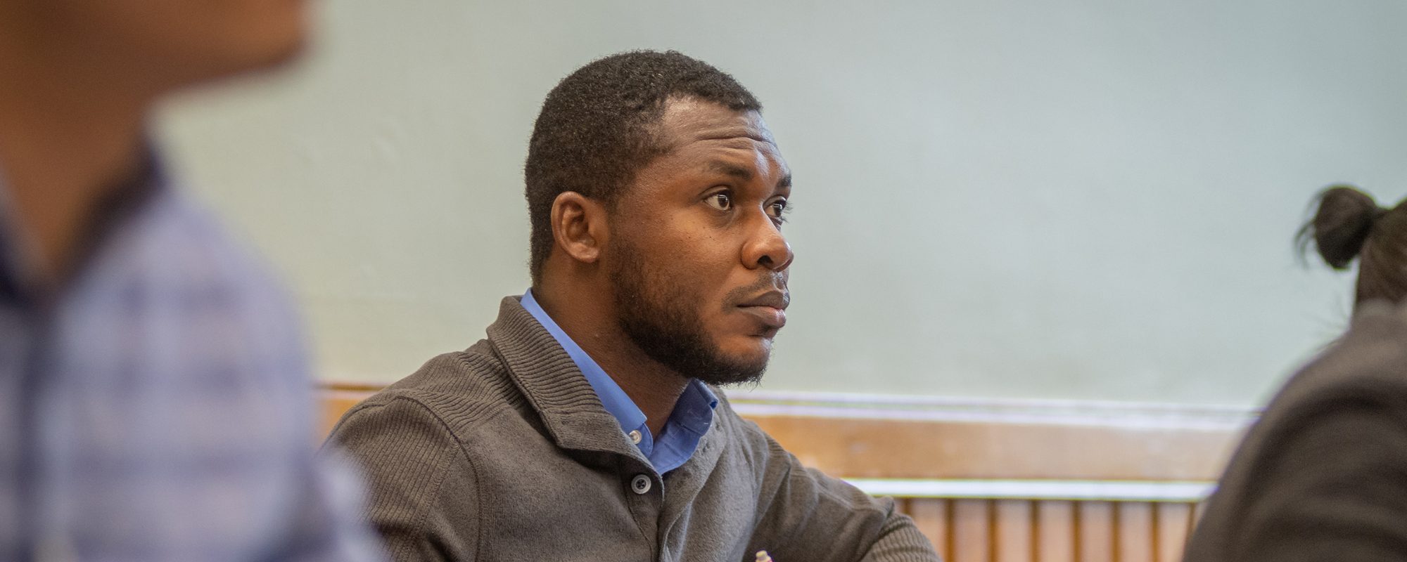 Ph.D. student intently looking at professor