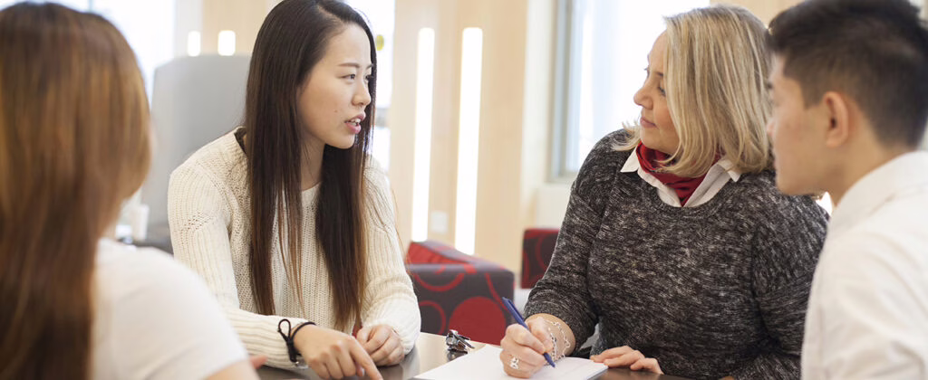 counselor Jessica Bane Roberts talking to students