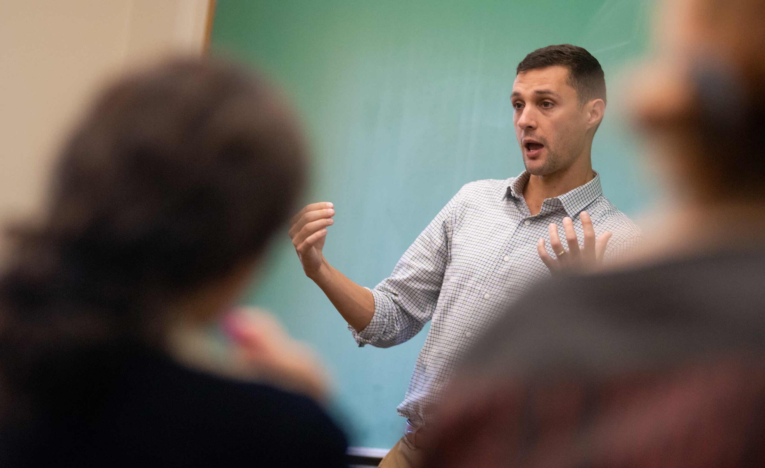 Jack Delehanty teaching a class on status and power