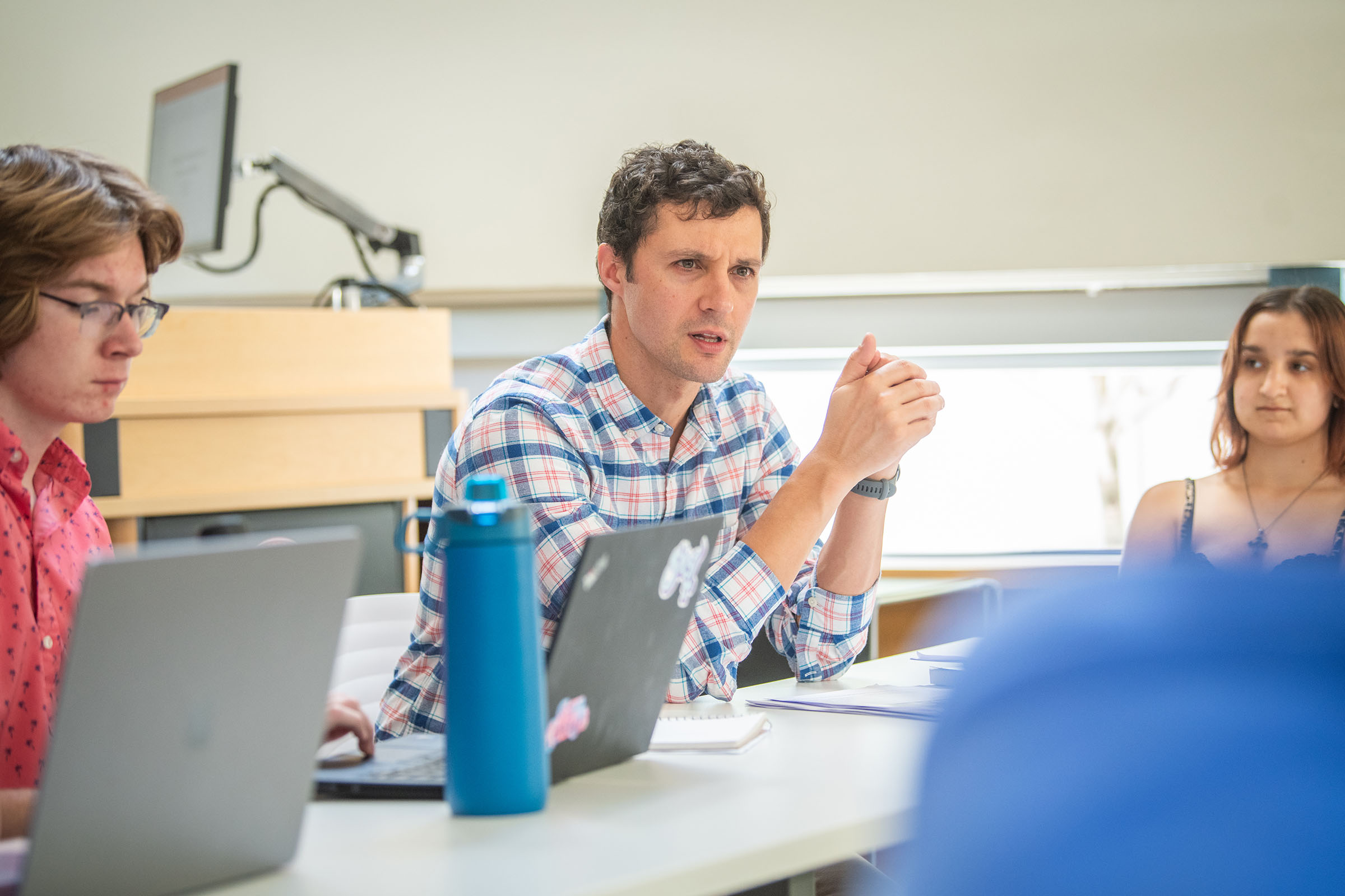 Professor Delehanty with students in classroom