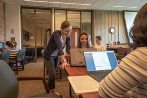 Staff helping student