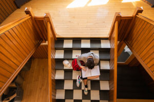 Student studying on stairs