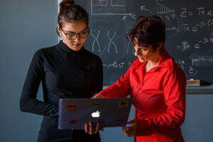 Professor talking to student