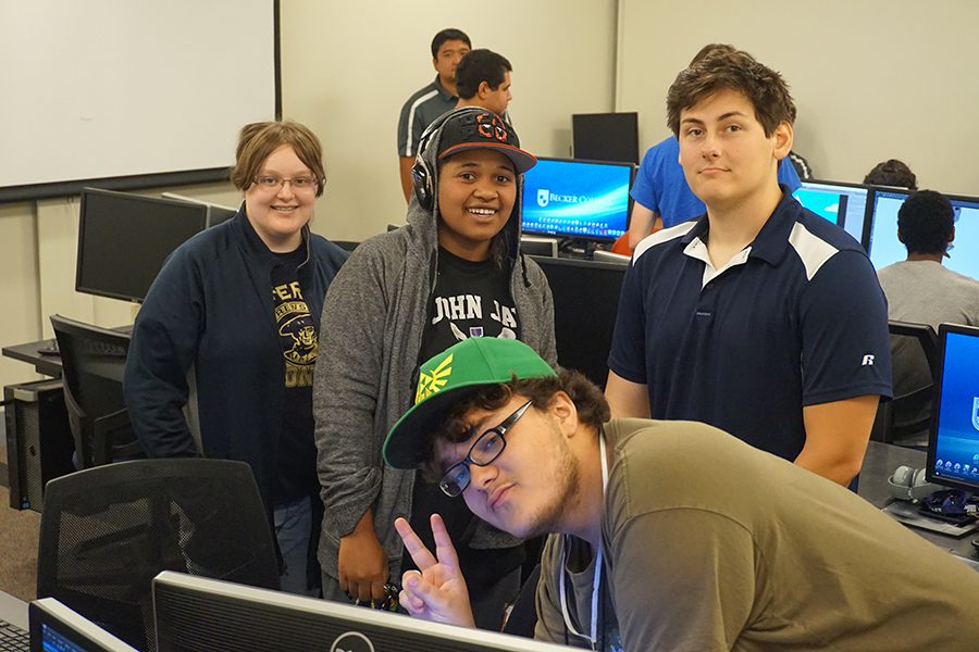 Summer game studios - students behind computers