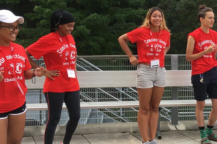 Connections at Clark student group playing a game