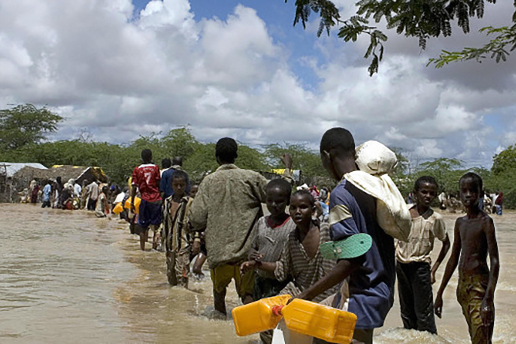 Refugees flee floodwaters