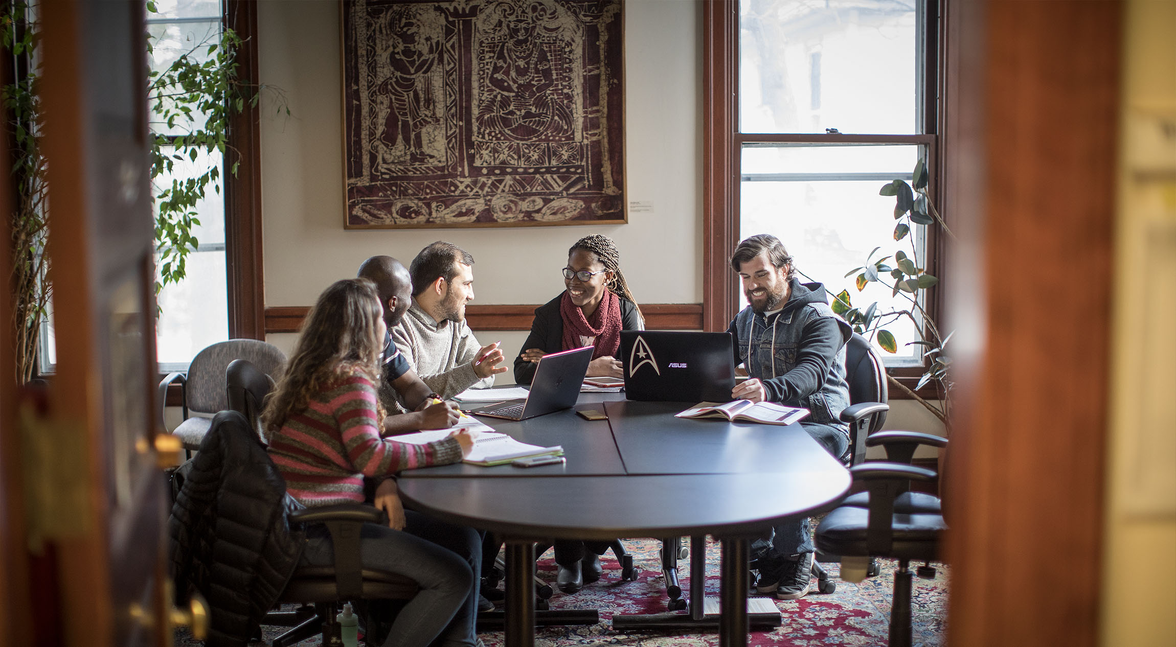 Graduate students conversing
