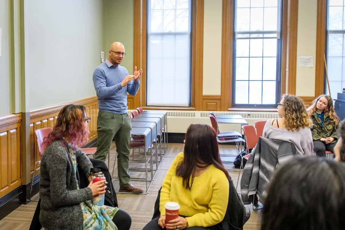 a teacher addresses the classroom
