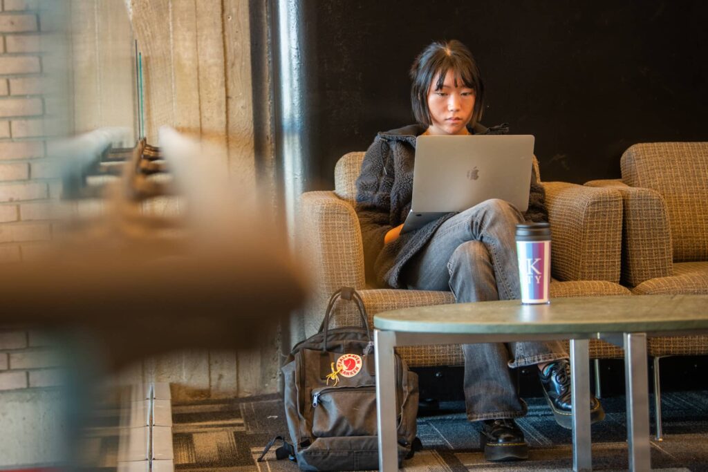 A student studies in the Goddard Library