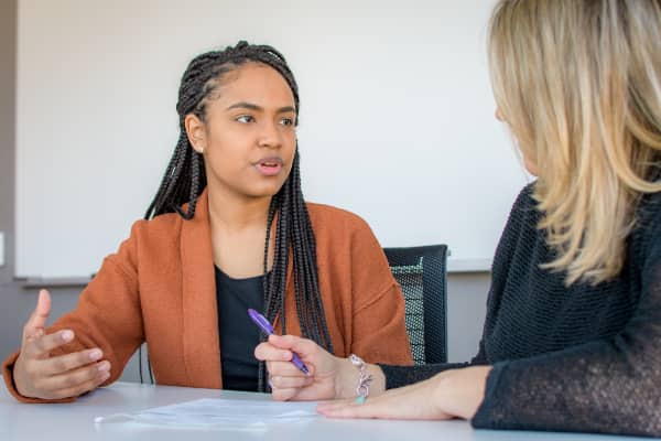 A student meets with her counselor