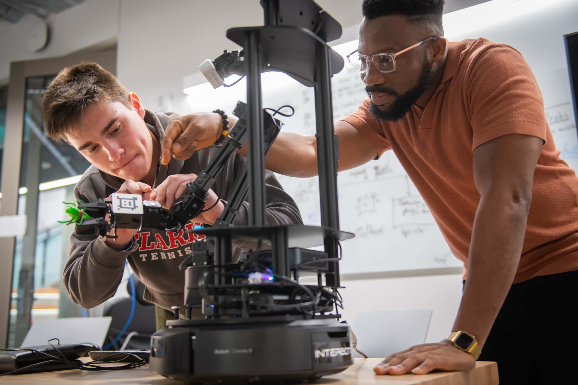 Students building in the robotics lab