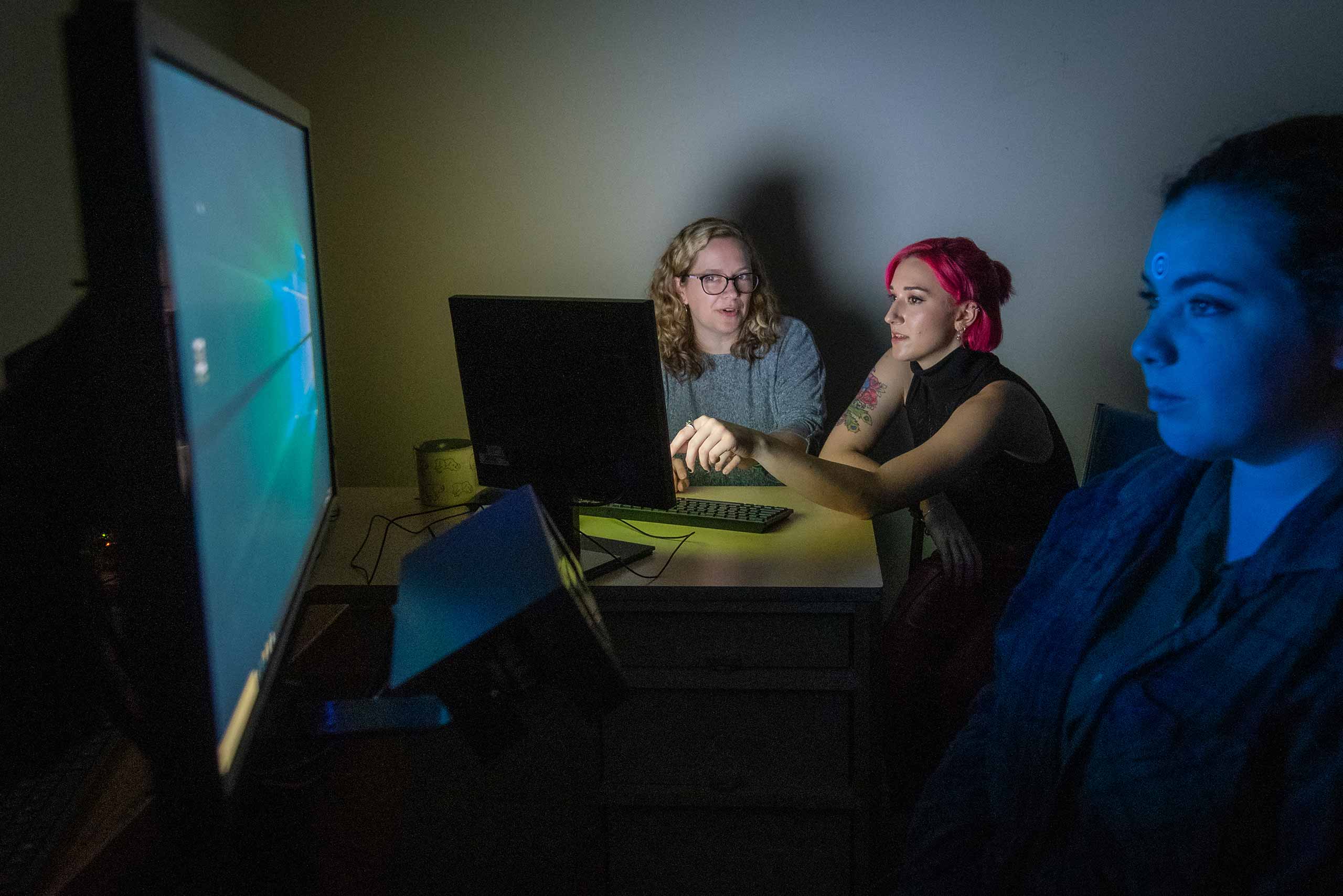 Researchers working in the psychology eye tracker lab