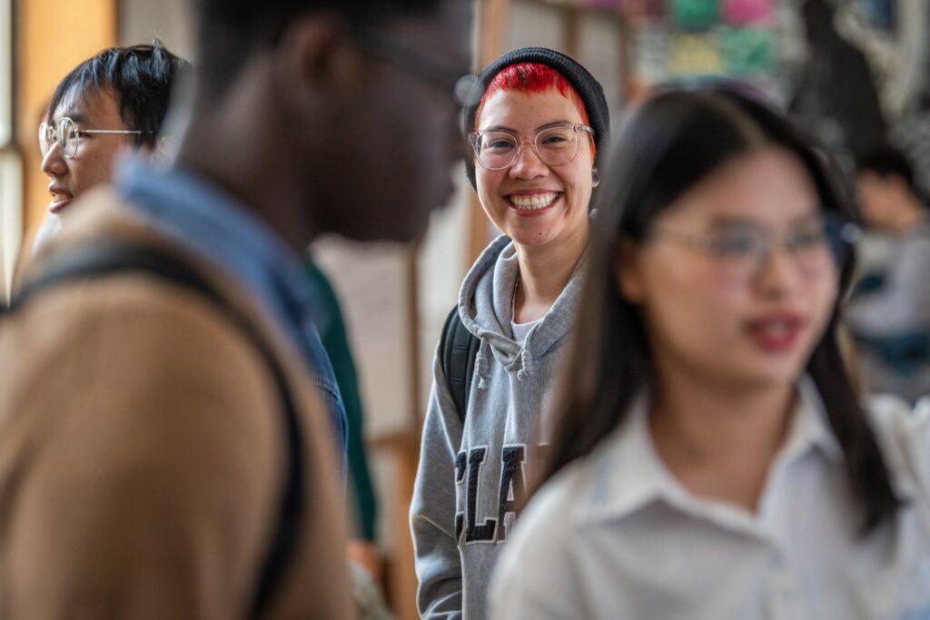 A student smiling at ClarkFest