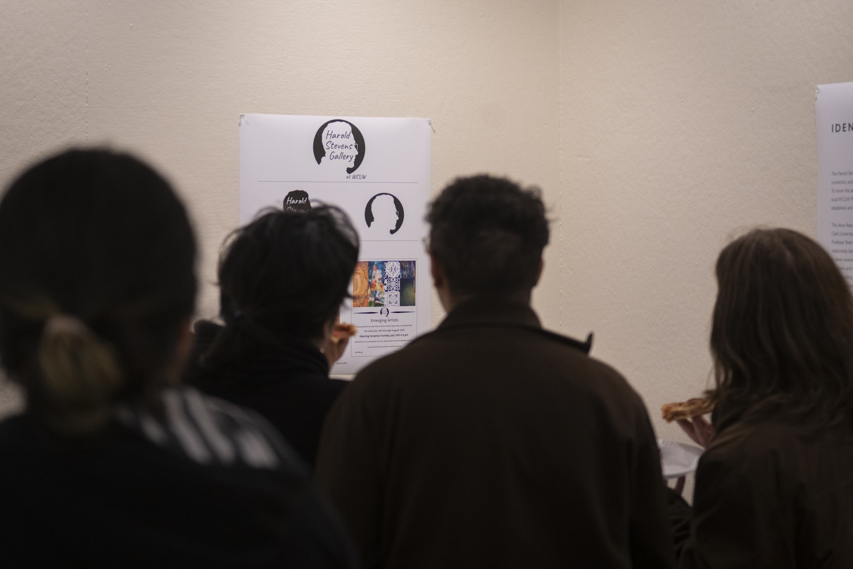 Students view and vote on the gallery's new graphic identity, designed by Clark students