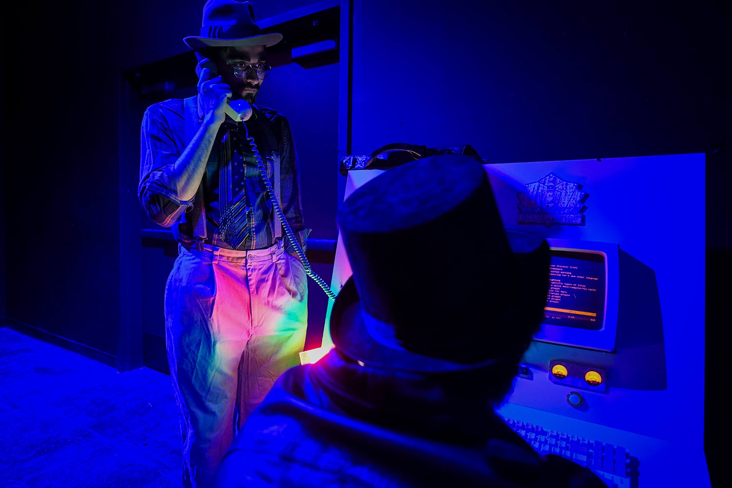 Two students at a console, dress rehearsal for Hacker’s Ostracon: An Interactive Performance
