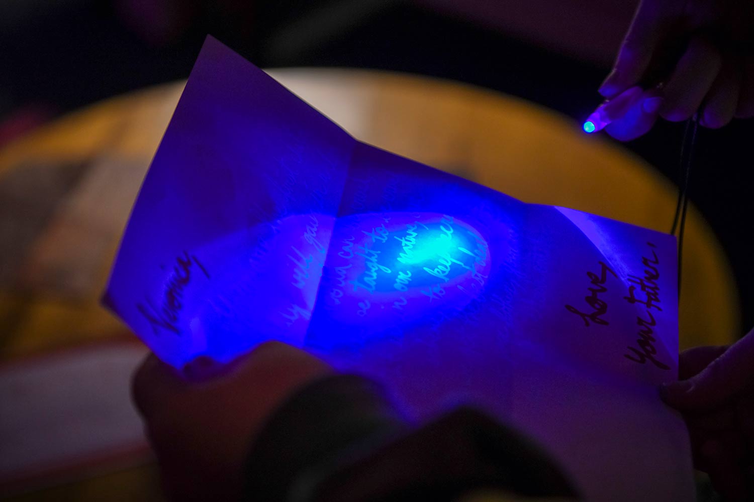 A student holds a clue, dress rehearsal for Hacker’s Ostracon: An Interactive Performance