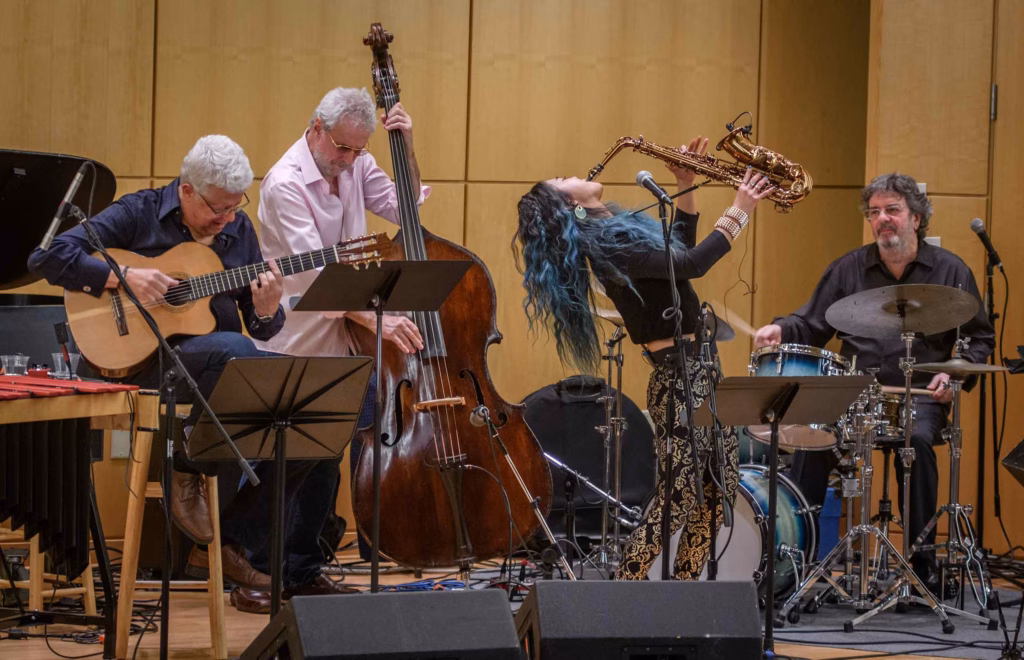 Soloist Grace Kelly, performs on saxophone with Trio da Paz, Romero Lubambo on guitar, Nilson Matta on bass, and Duduka da Fonseca on drums.