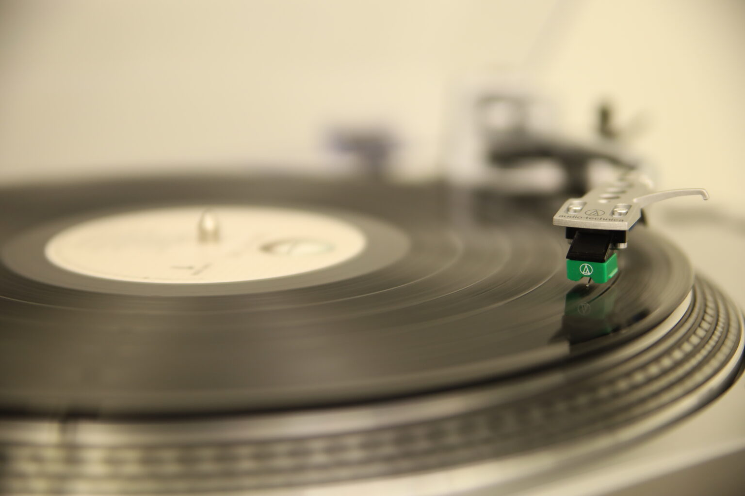 Vinyl record being played on a turntable