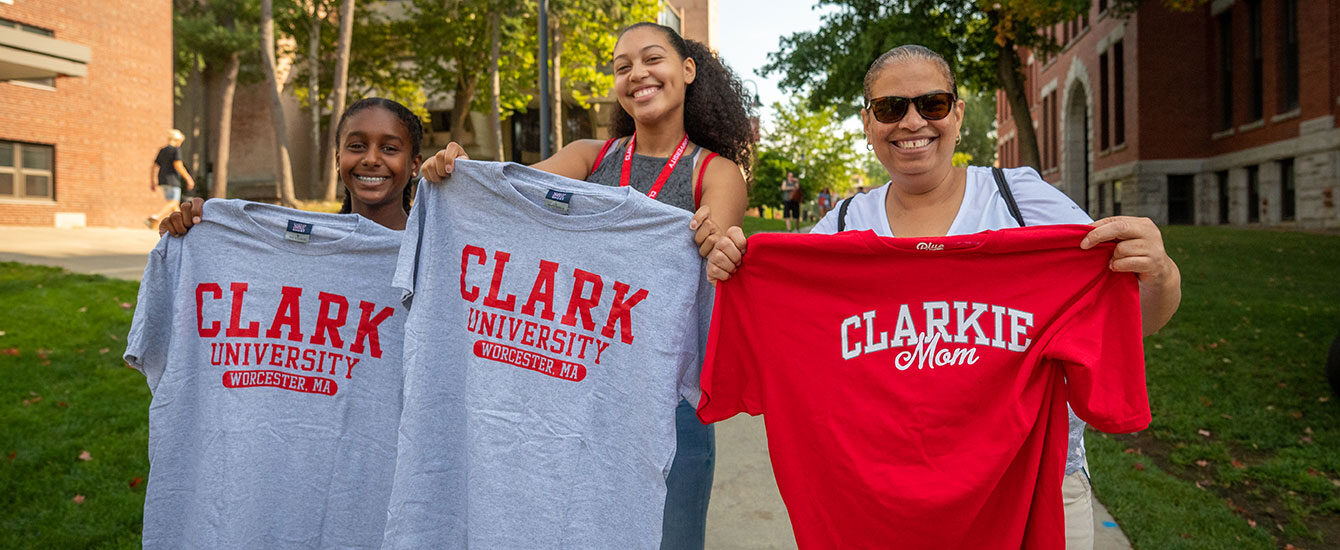 Clark famly holding t-shirt