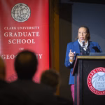 Dawn Wright speaks at a podium at Clark University