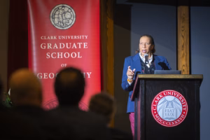Dawn Wright speaks at a podium at Clark University