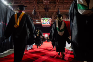 Graduate students process into their Commencement ceremony. Photo by Collin Hamilton ’27