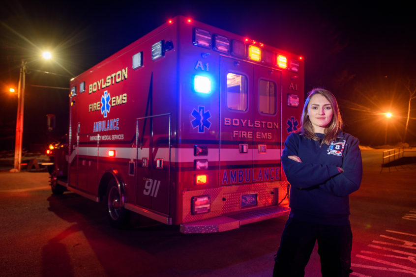 Lucyna Kogut standing behind ambulence