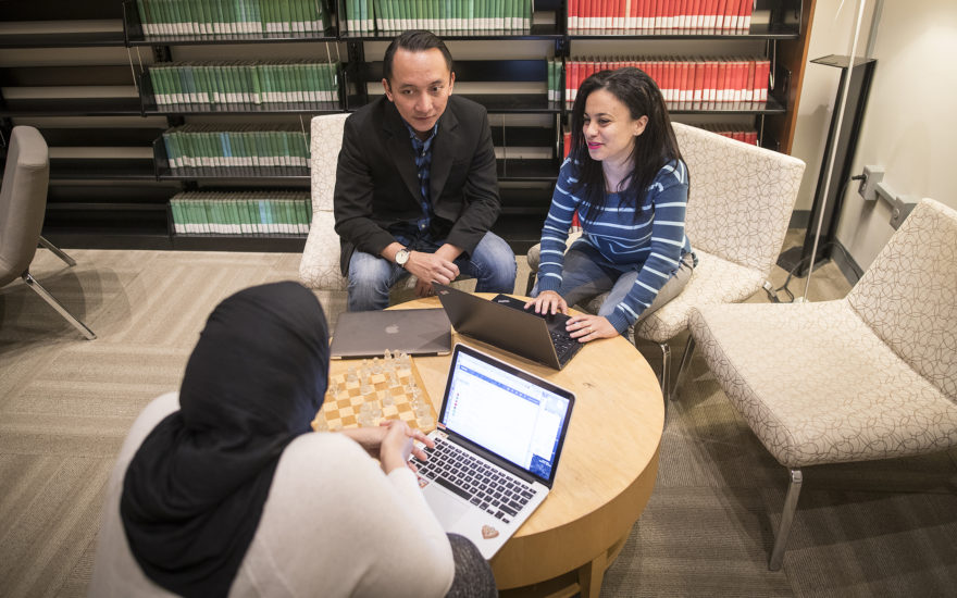 students sitting around table