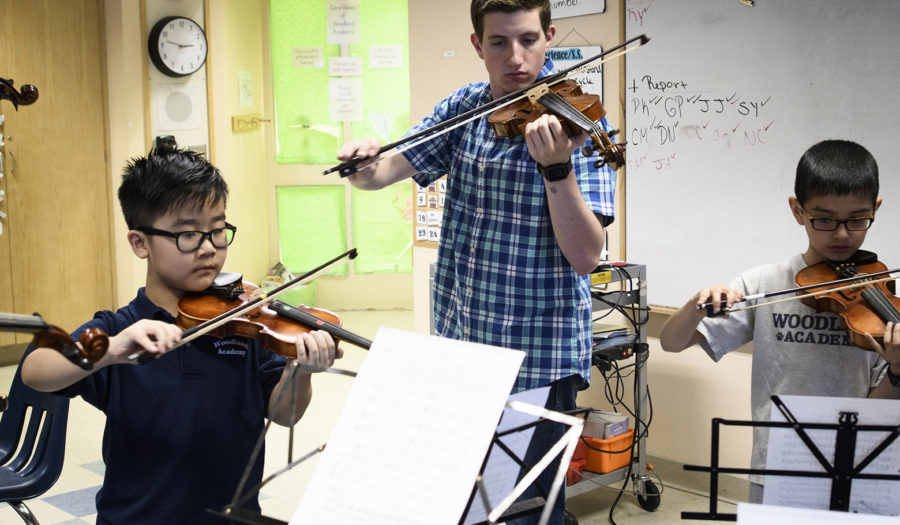 Students playing musical instrument