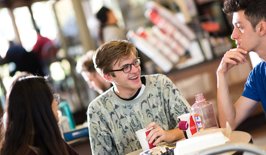 students eating at table