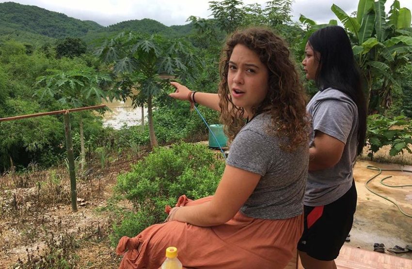 girls looking at water way in thailand