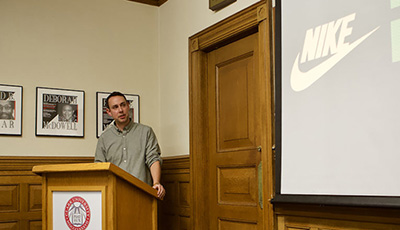 Alumnus at podium